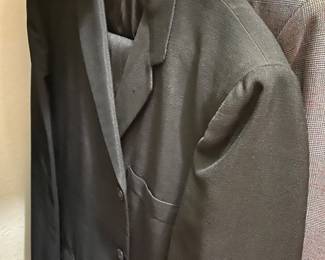 Nice selection of suits in master closet - apx 12 total - some are 3 pc with vest