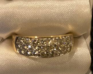14 karat two-tone diamond three stone ring, weighing 8.1 g.