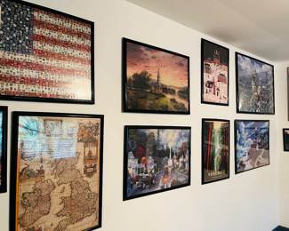 Collection of framed puzzle art