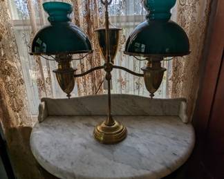 Marble top wash stand with student lamp.