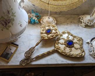 Jeweled brush and mirror.