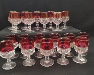 https://www.auctionninja.com/hewitt-estates-and-antiques/product/vintage-indiana-glass-ruby-red-top-kings-thumbprint-goblets-200233.html