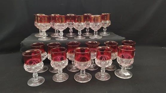 https://www.auctionninja.com/hewitt-estates-and-antiques/product/vintage-indiana-glass-ruby-red-top-kings-thumbprint-goblets-200233.html