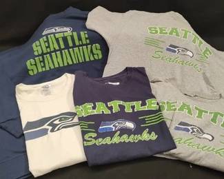 https://www.auctionninja.com/hewitt-estates-and-antiques/product/seattle-seahawks-shirts-200245.html