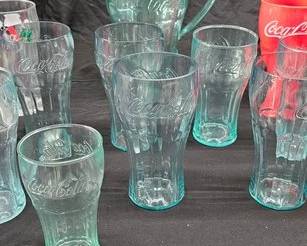 https://www.auctionninja.com/hewitt-estates-and-antiques/product/miscellaneous-collectible-coca-cola-plastic-cups-pitcher-300281.html