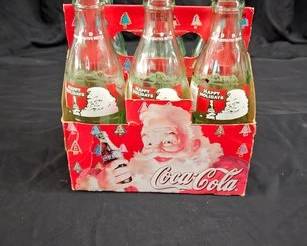 https://www.auctionninja.com/hewitt-estates-and-antiques/product/coca-cola-glass-bottles-1994-santa-claus-happy-holidays-empty-bottles--300272.html