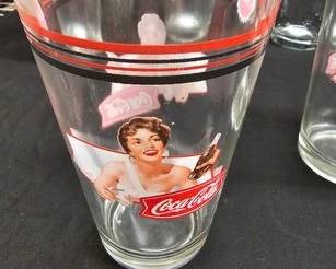 https://www.auctionninja.com/hewitt-estates-and-antiques/product/variety-of-collectible-coca-cola-glass-tumblers-300275.html