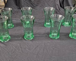 https://www.auctionninja.com/hewitt-estates-and-antiques/product/vintage-coca-cola-green-glass-flair-top--300310.html