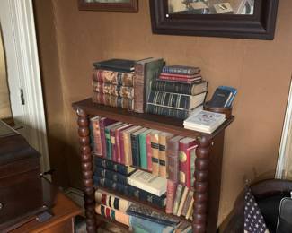 Library 
Bookcase with early books
O mirror 
