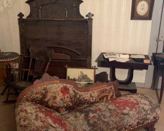 Primary Bedroom 
Fainting couch
Ornate bed