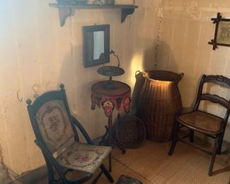 Primary Bedroom 
Large wicker basket 
Chairs 
Silverplate 