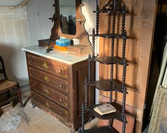 Primary Bedroom 
Marble top dresser 
Corner shelf