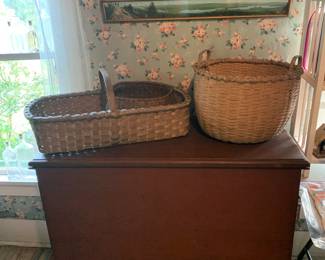 Bottle Room 
Red painted blanket chest
Old wicker baskets