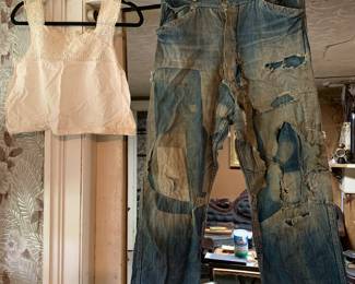 Closet/Green Bedroom 
20’s/30’s patched denim-buckle back