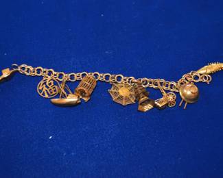 Gold charm bracelet