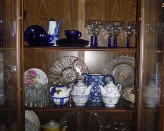 assorted glassware in hutch