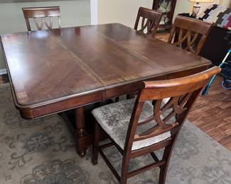 Ashley pub dining table with leaf and 6 chairs