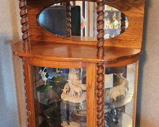 Oak cabinet with an ornate twist