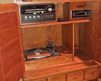 Ethan Allen Baumritter Heirloom Entertainment Unit with Louvered Doors and a Drawer with Pre-Installed Turntable, 8 Track Player Receiver / Radio, Built-In Speakers at Top and paperwork: collection of LP's, some of them are still shrink-wrapped!