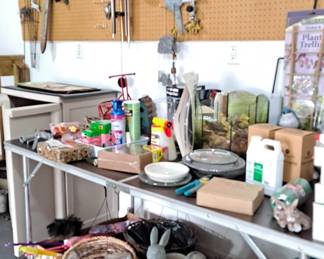 Assortment of Pots & Planters; Resin Garden Figures; Wind Chimes; Garden Signs & Hand Tools; Products for Plants; and Bird Feeders.