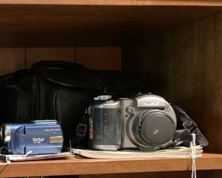 Assortment of Cameras:  Sony; Vivitar; Fujinon; Bell & Howell with bags and extras.