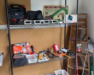 Black Metal Storage Shelf; Hand Tools, Black & Decker Tools i.e., drills, sanders, etc.; Blackhawk Socket Set; Weasel Claw Tiller; Wood Ladder; Solar Lights; Bionic Burner / Trimmer