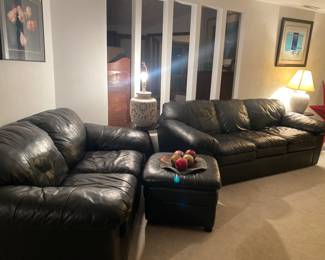 Black leather sofa and loveseat, ottoman