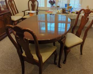 Lovely dining room set complete or can be separated including pads and leaves