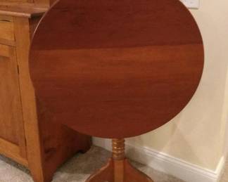 Antique cherry tilt top tea table