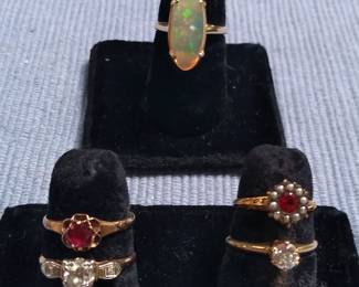 Red gemstones and diamond rings