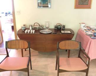 Set of 4 Selig Kofod Larsen dsigned caned back dining chairs (all but one have damage to caning). 