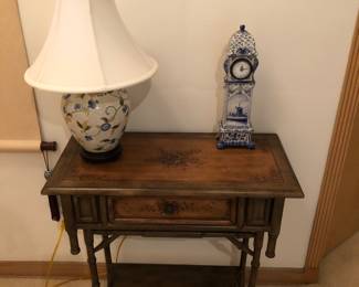 Antique blue and white clock has crack