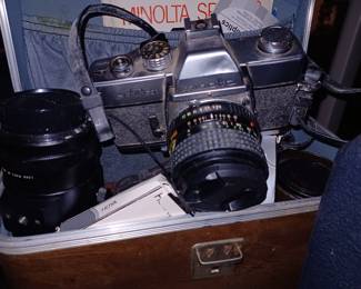 Minolta 35mm Camera with addition Len's and Case.