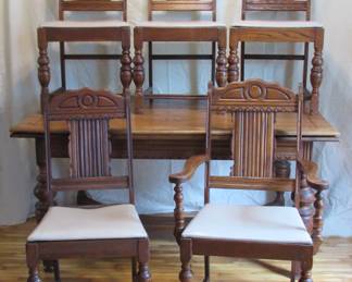 oak refectory table and chairs with hidden leaves