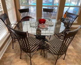 Glass Table & 6 Chairs
Table is in great shape
One of the chairs has been damaged from falling but is still usable.
Table: 54” across x 29” tall
Chairs: 22” across x 18” deep x 19” tall to seat, 40” tall to back. 
Must be able to move and load yourself