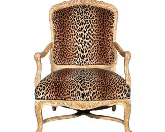 CHEETAH PRINT ARMCHAIR | Large wide armchair with cheetah-print cushion and composite frame. - l. 30 x w. 25 x h. 42.5 in