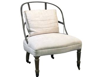 RESTORATION HARDWARE COUTURIER'S CHAIR | Metal-backed chair with riveted supports atop a cream-colored cushion with turned wooden legs with antiqued nickel finished casters. - l. 23 x w. 23 x h. 31 in