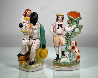 (2PC) PAIR STAFFORDSHIRE PAINTED FIGURINES | Includes shepherd with dog and lamb, and Uncle Tom. -  l. 4 x w. 4 x h. 10 in