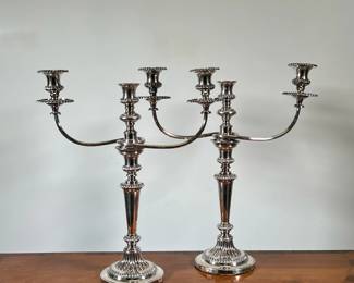 (2PC) PAIR-PAINTED SILVER CANDELABRAS | Pair of silver painted candelabras with curved metal arms supporting 2 candleholders. -  l. 16 x w. 5.5 x h. 18 in