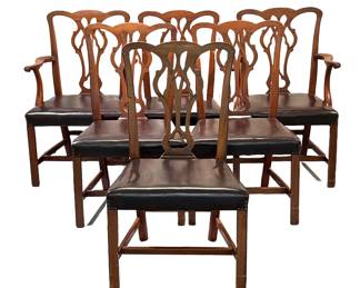 (6PC) MAHOGANY AND LEATHER DINING CHAIRS | Includes; 2 armchairs and 4 dining chairs with intricate carved back and curved arm rests leading to a mahogany leather cushion. - l. 25 x w. 23 x h. 38 in