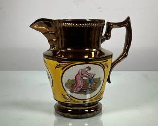 BRONZE PAINTED CERAMIC PITCHER | Ceramic pitcher painted metallic bronze with scene of mother playing her child. - h. 8.5 x dia. 6.5 in