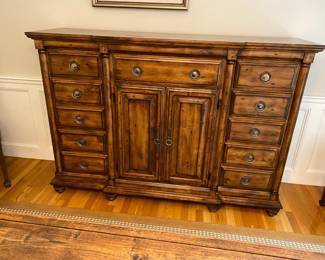 Sideboard is 70" long, 19" deep and 50" tall.