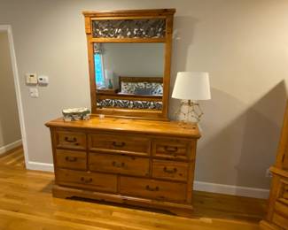 Dresser 66" length, 19" deep, 38" tall.   Mirror is 4' by 40".