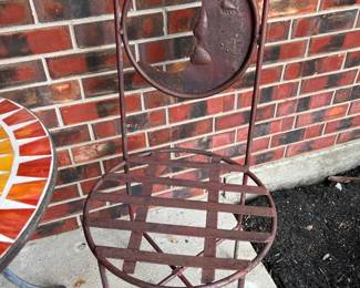 2' Round Red, Yellow, and Black Mosaic Outdoor Side Table with Tile Top and Two (Sun & Moon) Wrought Iron Chairs