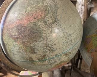 20. Replogle globe on tall stand. $65
