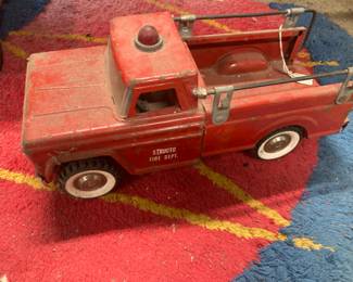 29. Structo fire dept. metal fire truck . $50