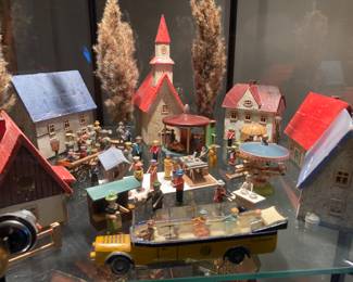 64. Erzgeberg buildings, vehicles and people.