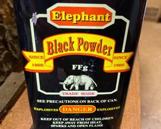 75. Elephant black powder tin. $45.