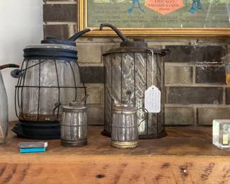 85. Lantern refilling bottles. Assorted sizes and prices. 