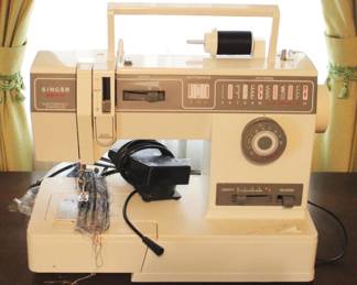 73 - Singer Sewing Machine - 15" x 17" x 7"
